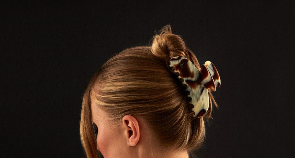 Twisted updo held with a large TEGEN French Handmade claw clip