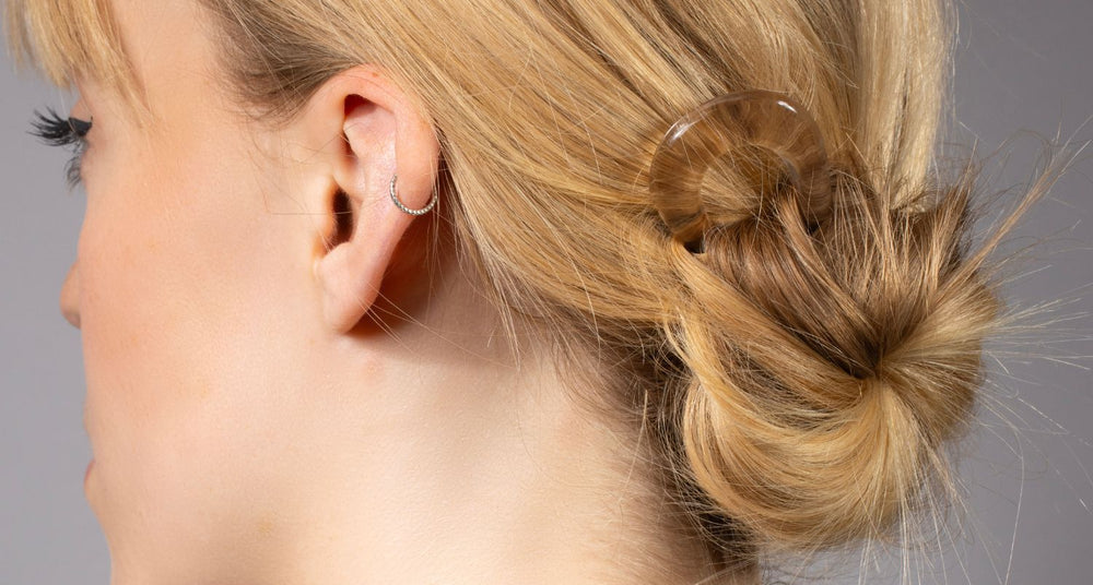 Low bun held with a TEGEN French Handmade chignon pin