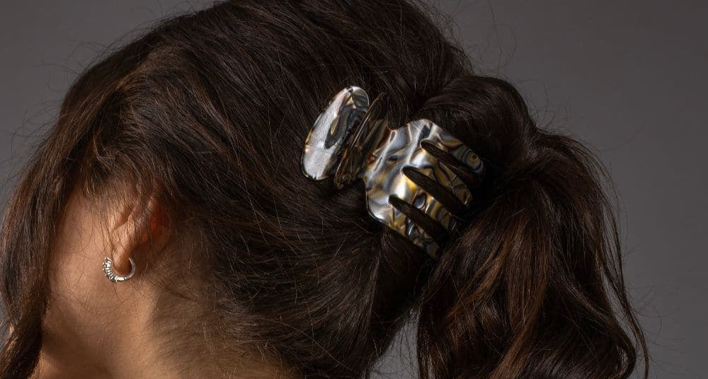 Half-up style held with a TEGEN Sophia side claw clip