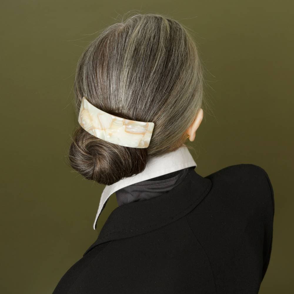https://tegenaccessories.com/cdn/shop/files/oat-latte-wide-arched-barrette-clip-11cm-french-handmade-hair-accessories-at-tegen-accessories-2.jpg?v=1700674682